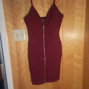 Maroon mini dress with gold zipper in the front